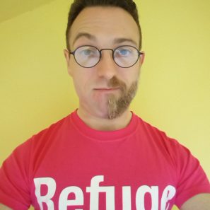 Image of fundraiser with half his beard shaved